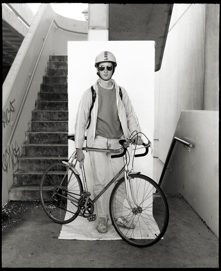 Belconnen Mall parking area stairwell 1990: Young man with bike