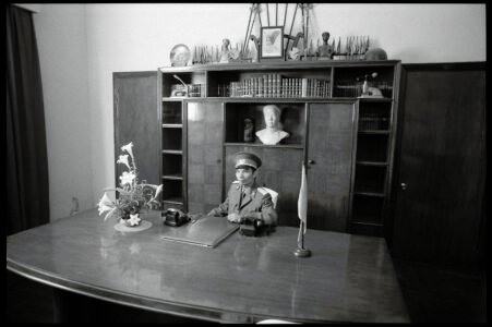 Photographic portrait of a man in uniform at the Bao Dai Villa by Spiros Coutroubas, Vietnam, 1996 Vietnam 1996: portrait of a man in uniform at the Bao Dai Villa near Dalat, by Spiros Coutroubas, part of a series of documentary photographs of people and places in Vietnam in the 1990s