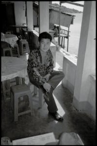 Photographic portrait of an overseas Vietnamese man at Nha Trang, by Spiros Coutroubas, Vietnam, 1996 Vietnam 1996: portrait of an overseas Vietnamese man at Nha Trang, by Spiros Coutroubas - part of a series of documentary photographs of people and places in Vietnam in the 1990s