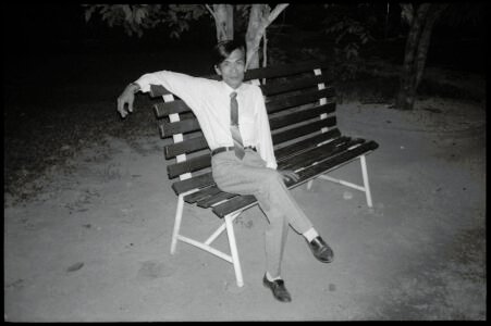 Vietnam 1996: portrait of a man at Van Thanh Park, by Spiros Coutroubas - part of a series of documentary photographs of people and places in Vietnam in the 1990s