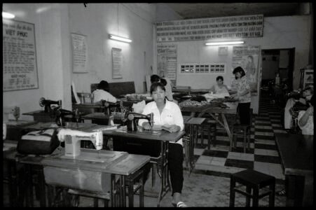 Photographic portrait of a woman at sewing night-school by Spiros Coutroubas, Saigon, Vietnam, 1996 Vietnam 1996: portrait a woman at sewing night-school in Saigon, by Spiros Coutroubas - part of a series of documentary photographs of people and places in Vietnam in the 1990s