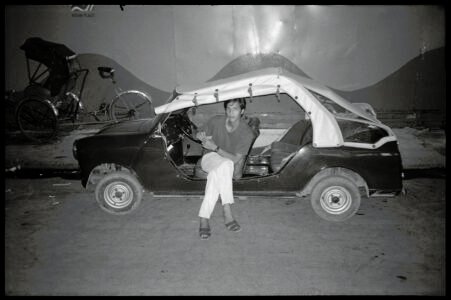 Photographic portrait by Spiros Coutroubas, Ho Chi Minh City, Vietnam, 1996 Vietnam 1996: portrait of a man in a car in Saigon, by Spiros Coutroubas - part of a series of documentary photographs of people and places in Vietnam in the 1990s