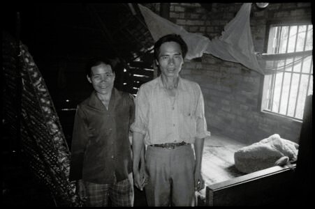 Photographic portrait of a rural couple by Spiros Coutroubas, Bao Loc, Lam Dong Province, Vietnam, 1996 Vietnam 1996: portrait of a rural couple near Bao Loc, Lam Dong Province, by Spiros Coutroubas - part of a series of documentary photographs of people and places in Vietnam in the 1990s