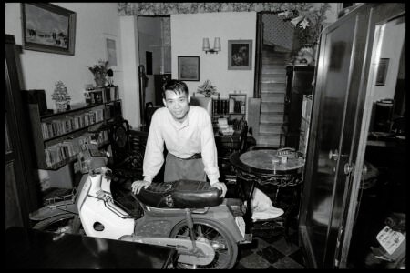 Photographic portrait of Mr Lam at home by Spiros Coutroubas, Ho Chi Minh City, Vietnam, 1997 Vietnam 1997: portrait of Mr Lam at home in Saigon, by Spiros Coutroubas - part of a series of documentary photographs of people and places in Vietnam in the 1990s