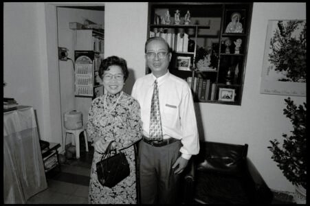 Photographic portrait of an urban couple at home by Spiros Coutroubas, Ho Chi Minh City, Vietnam, 1997 Vietnam 1997: portrait of an urban couple at home in Saigon, by Spiros Coutroubas - part of a series of documentary photographs of people and places in Vietnam in the 1990s